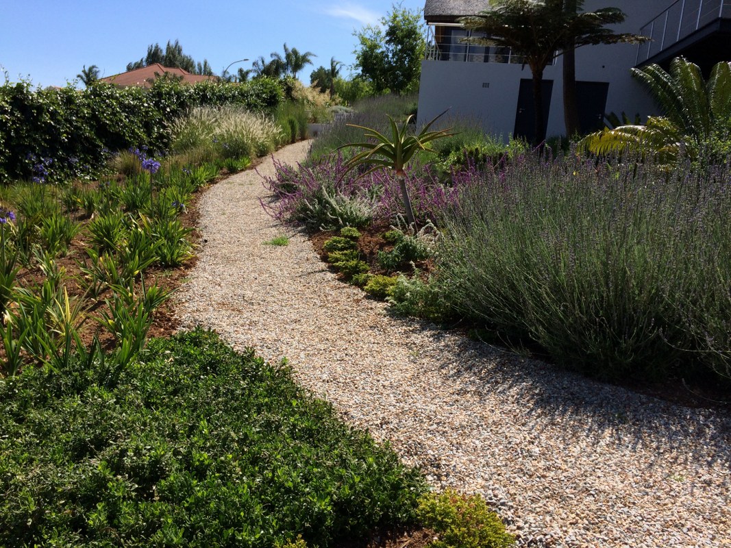 Eti Buys, founder of Kimko Landscaping, on site in a garden